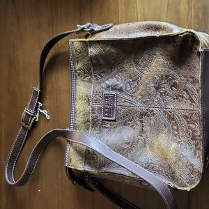 Relic embossed leather crossbody bag